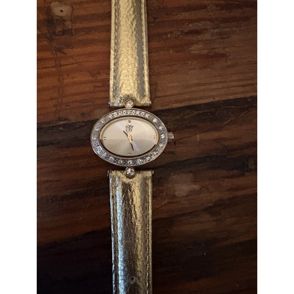 Vintage Elizabeth Taylor Avon Oval Rhinestone Bezel Gold Tone Ladies Watch